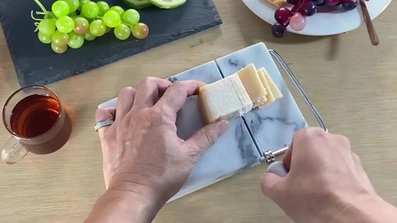 How to Use a Black Marble Cheese Slicer Properly?